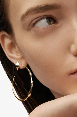 Creolen aus Gelbgold und Diamanten Curve 50